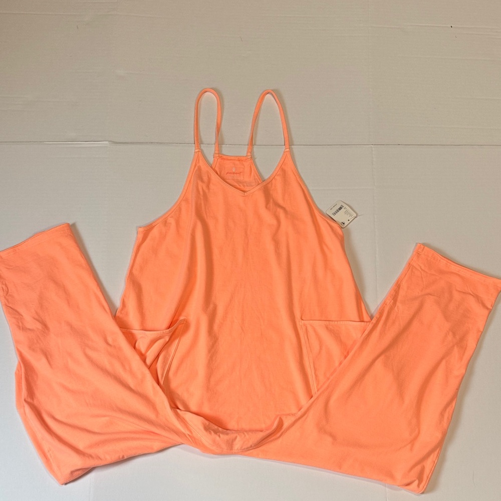 Free People peach Jumpsuit Sleeveless. NWT .